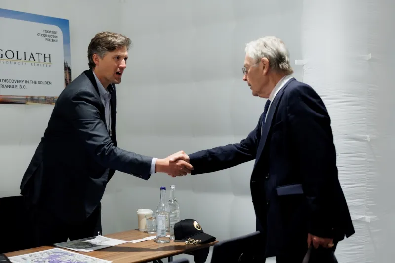 Mining industry professionals shaking hands during a meeting at 121 London