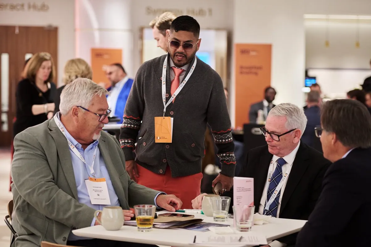 Mining industry professionals discussing opportunities during a meeting at 121 London