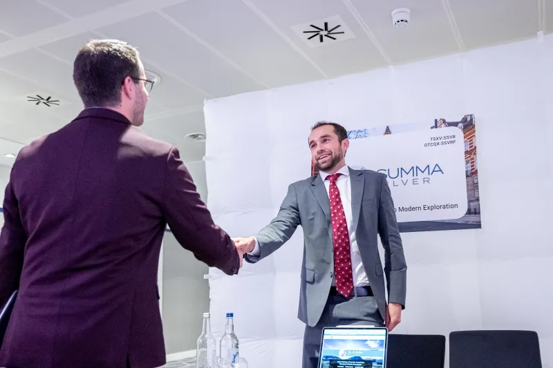 Mining industry professionals shaking hands during a meeting at 121 London